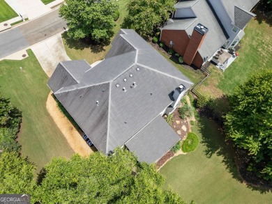 Charming Two-Story Traditional with Private Pond Access on The Golf Club At Bradshaw Farm in Georgia - for sale on GolfHomes.com, golf home, golf lot