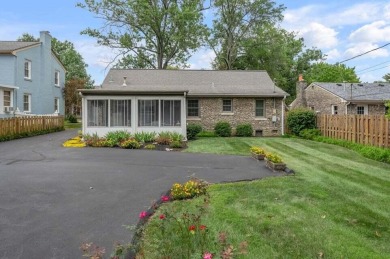 This cape cod style stone beauty in Fairway subdivision is for on Idle Hour Country Club in Kentucky - for sale on GolfHomes.com, golf home, golf lot