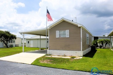 This super fun 1BR/1BA tiny home packs a lot of punch! This home on Lily Lake Golf and RV Resort in Florida - for sale on GolfHomes.com, golf home, golf lot