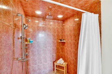 Stunning penthouse, prime location with long gorgeous water on Oak Harbor Country Club in Florida - for sale on GolfHomes.com, golf home, golf lot