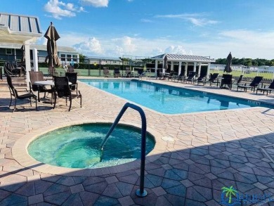This super fun 1BR/1BA tiny home packs a lot of punch! This home on Lily Lake Golf and RV Resort in Florida - for sale on GolfHomes.com, golf home, golf lot