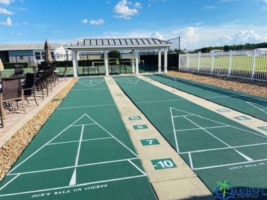 This super fun 1BR/1BA tiny home packs a lot of punch! This home on Lily Lake Golf and RV Resort in Florida - for sale on GolfHomes.com, golf home, golf lot