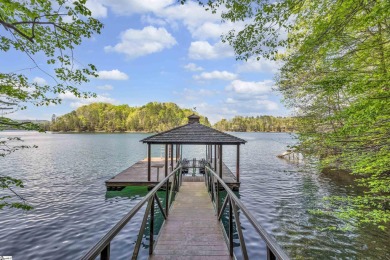 Instantly relax in the tucked away splendor of Stone Vista Manor on The Reserve At Lake Keowee in South Carolina - for sale on GolfHomes.com, golf home, golf lot