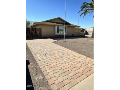 Darling home, freshly painted and ready for your personal on Sun City Lakes West and East in Arizona - for sale on GolfHomes.com, golf home, golf lot