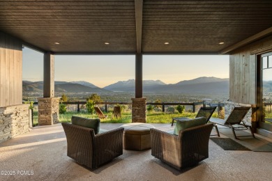 Perched atop a prominent ridgeline, this stunning residence is on Red Ledges Golf Club in Utah - for sale on GolfHomes.com, golf home, golf lot