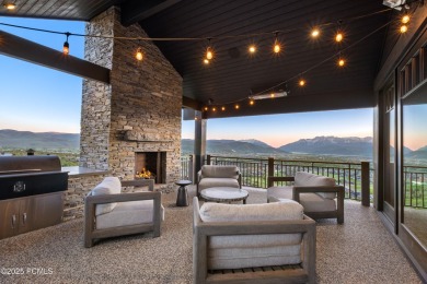 Perched atop a prominent ridgeline, this stunning residence is on Red Ledges Golf Club in Utah - for sale on GolfHomes.com, golf home, golf lot