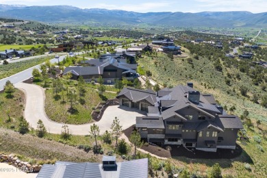 Perched atop a prominent ridgeline, this stunning residence is on Red Ledges Golf Club in Utah - for sale on GolfHomes.com, golf home, golf lot