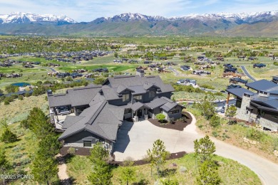 Perched atop a prominent ridgeline, this stunning residence is on Red Ledges Golf Club in Utah - for sale on GolfHomes.com, golf home, golf lot