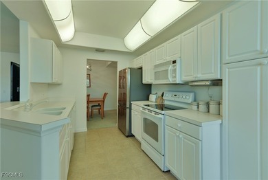 EXCELLENT LOCATION FOR THIS 2BR+DEN FIRST FLOOR UNIT WITH on Colonial Country Club in Florida - for sale on GolfHomes.com, golf home, golf lot