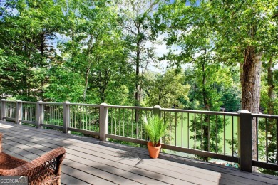Welcome to 117 Lakeview Circle-an exceptional lakefront retreat on The Highlands Course at Lake Arrowhead in Georgia - for sale on GolfHomes.com, golf home, golf lot