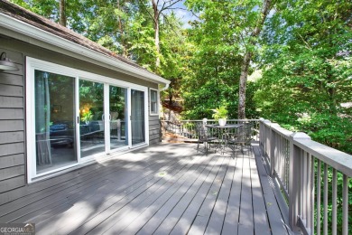 Welcome to 117 Lakeview Circle-an exceptional lakefront retreat on The Highlands Course at Lake Arrowhead in Georgia - for sale on GolfHomes.com, golf home, golf lot