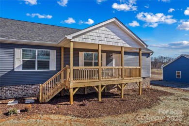 Located in the River Rock neighborhood, this brand new home on River Oaks Country Club in North Carolina - for sale on GolfHomes.com, golf home, golf lot