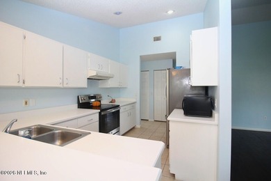 Fall in love with this charming 3 bedroom 2 baths at 48 Westover on The Grand Club - Pine Lakes Course in Florida - for sale on GolfHomes.com, golf home, golf lot