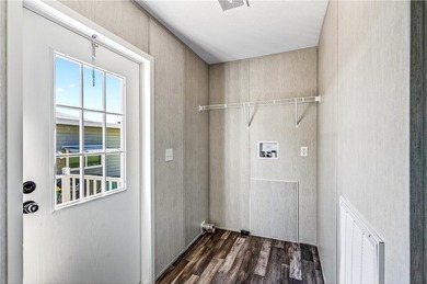 Start fresh in Barefoot Bay! This brand new manufactured home is on Barefoot Bay Golf Course in Florida - for sale on GolfHomes.com, golf home, golf lot