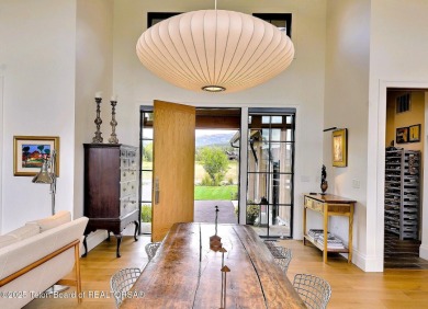 This Modern Masterpiece transcends ordinary luxury with sleek on Teton Springs Resort and Club in Idaho - for sale on GolfHomes.com, golf home, golf lot