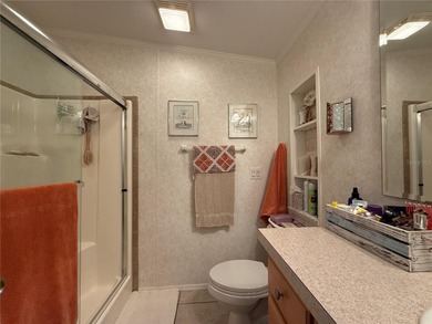 Wake up each day to warm breezes, glowing sunsets, and the easy on Apollo Beach Golf and Sea Club in Florida - for sale on GolfHomes.com, golf home, golf lot