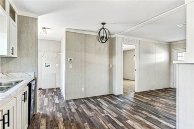 Start fresh in Barefoot Bay! This brand new manufactured home is on Barefoot Bay Golf Course in Florida - for sale on GolfHomes.com, golf home, golf lot