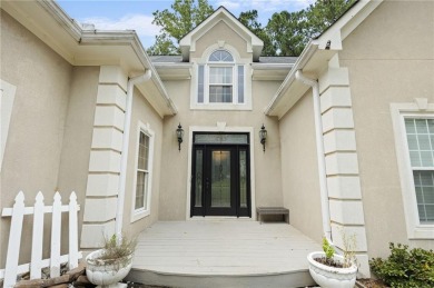 Nestled gracefully on the 4th fairway, this exquisite home on Brookstone Golf and Country Club in Georgia - for sale on GolfHomes.com, golf home, golf lot