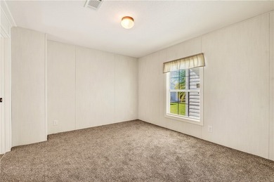 Start fresh in Barefoot Bay! This brand new manufactured home is on Barefoot Bay Golf Course in Florida - for sale on GolfHomes.com, golf home, golf lot