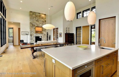 This Modern Masterpiece transcends ordinary luxury with sleek on Teton Springs Resort and Club in Idaho - for sale on GolfHomes.com, golf home, golf lot
