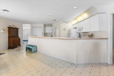 Lakeside Paradise with Heated Pool - Fully Furnished  Move-In on Lemon Bay Golf Club in Florida - for sale on GolfHomes.com, golf home, golf lot