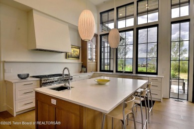 This Modern Masterpiece transcends ordinary luxury with sleek on Teton Springs Resort and Club in Idaho - for sale on GolfHomes.com, golf home, golf lot