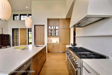 This Modern Masterpiece transcends ordinary luxury with sleek on Teton Springs Resort and Club in Idaho - for sale on GolfHomes.com, golf home, golf lot