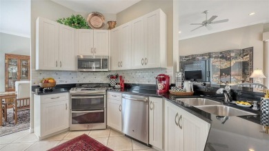 Welcome to this beautifully maintained 2-bedroom, 2-bathroom on University Park Country Club in Florida - for sale on GolfHomes.com, golf home, golf lot