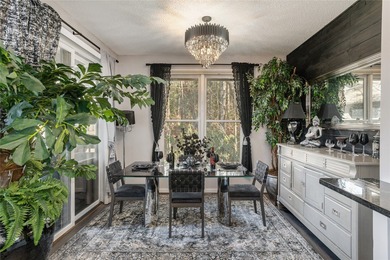 Enjoy outdoor living in the Racquet Club Villas at Burlingame on Burlingame Country Club in North Carolina - for sale on GolfHomes.com, golf home, golf lot