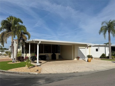 Wake up each day to warm breezes, glowing sunsets, and the easy on Apollo Beach Golf and Sea Club in Florida - for sale on GolfHomes.com, golf home, golf lot