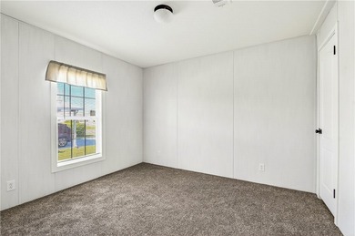 Start fresh in Barefoot Bay! This brand new manufactured home is on Barefoot Bay Golf Course in Florida - for sale on GolfHomes.com, golf home, golf lot