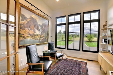 This Modern Masterpiece transcends ordinary luxury with sleek on Teton Springs Resort and Club in Idaho - for sale on GolfHomes.com, golf home, golf lot
