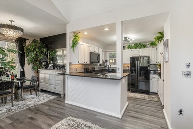 Enjoy outdoor living in the Racquet Club Villas at Burlingame on Burlingame Country Club in North Carolina - for sale on GolfHomes.com, golf home, golf lot