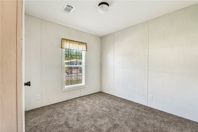 Start fresh in Barefoot Bay! This brand new manufactured home is on Barefoot Bay Golf Course in Florida - for sale on GolfHomes.com, golf home, golf lot