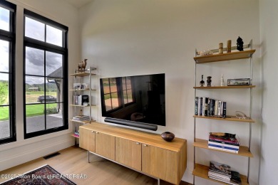 This Modern Masterpiece transcends ordinary luxury with sleek on Teton Springs Resort and Club in Idaho - for sale on GolfHomes.com, golf home, golf lot