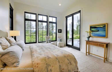 This Modern Masterpiece transcends ordinary luxury with sleek on Teton Springs Resort and Club in Idaho - for sale on GolfHomes.com, golf home, golf lot