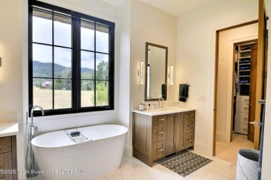 This Modern Masterpiece transcends ordinary luxury with sleek on Teton Springs Resort and Club in Idaho - for sale on GolfHomes.com, golf home, golf lot