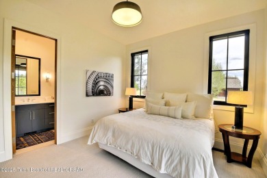 This Modern Masterpiece transcends ordinary luxury with sleek on Teton Springs Resort and Club in Idaho - for sale on GolfHomes.com, golf home, golf lot