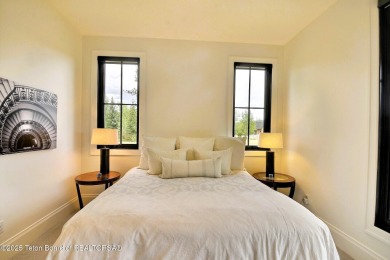 This Modern Masterpiece transcends ordinary luxury with sleek on Teton Springs Resort and Club in Idaho - for sale on GolfHomes.com, golf home, golf lot