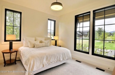 This Modern Masterpiece transcends ordinary luxury with sleek on Teton Springs Resort and Club in Idaho - for sale on GolfHomes.com, golf home, golf lot