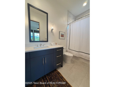 This Modern Masterpiece transcends ordinary luxury with sleek on Teton Springs Resort and Club in Idaho - for sale on GolfHomes.com, golf home, golf lot