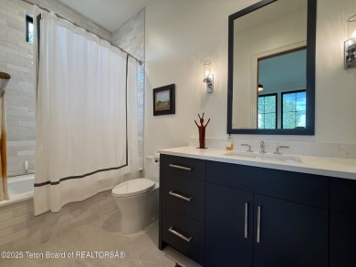 This Modern Masterpiece transcends ordinary luxury with sleek on Teton Springs Resort and Club in Idaho - for sale on GolfHomes.com, golf home, golf lot