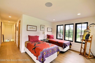 This Modern Masterpiece transcends ordinary luxury with sleek on Teton Springs Resort and Club in Idaho - for sale on GolfHomes.com, golf home, golf lot