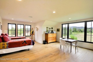 This Modern Masterpiece transcends ordinary luxury with sleek on Teton Springs Resort and Club in Idaho - for sale on GolfHomes.com, golf home, golf lot