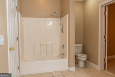 Nestled in the prestigious Orchard neighborhood, this stunning on The Orchard Golf and Country Club in Georgia - for sale on GolfHomes.com, golf home, golf lot