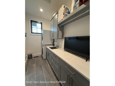 This Modern Masterpiece transcends ordinary luxury with sleek on Teton Springs Resort and Club in Idaho - for sale on GolfHomes.com, golf home, golf lot