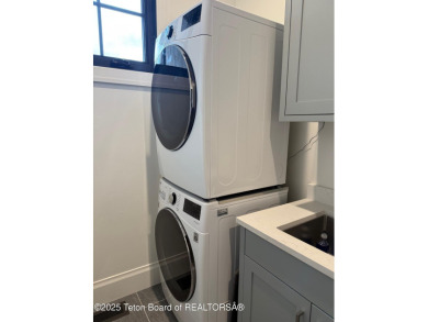 This Modern Masterpiece transcends ordinary luxury with sleek on Teton Springs Resort and Club in Idaho - for sale on GolfHomes.com, golf home, golf lot