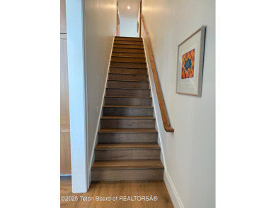 This Modern Masterpiece transcends ordinary luxury with sleek on Teton Springs Resort and Club in Idaho - for sale on GolfHomes.com, golf home, golf lot