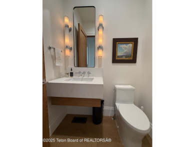 This Modern Masterpiece transcends ordinary luxury with sleek on Teton Springs Resort and Club in Idaho - for sale on GolfHomes.com, golf home, golf lot