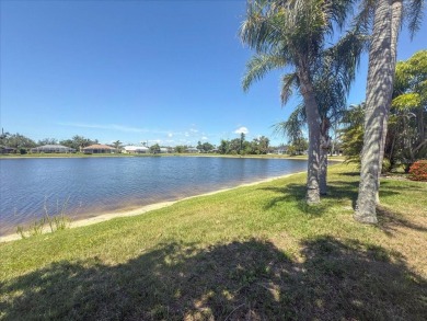 Lakeside Paradise with Heated Pool - Fully Furnished  Move-In on Lemon Bay Golf Club in Florida - for sale on GolfHomes.com, golf home, golf lot